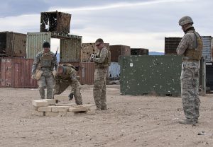 Military conex U.S._Air_Force_Staff_Sgt._Jeremy_Redfern_and_his_team_prepare_an_area_for_a_controlled_detonation_during_an_exercise_at_Fort_Carson_Colo_130110-F-PB776-165-300×208 Military conex